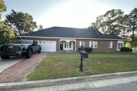 Brick ranch with an arched front porch in North Georgia